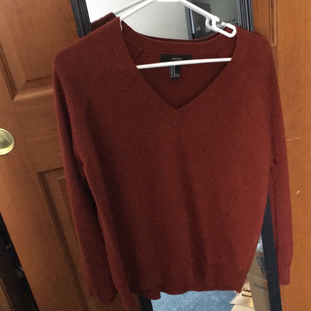 Gorgeous burnt orange sweater.